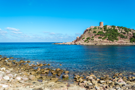 View of sardinian coast and beach of Porticciolo - Alghero - in a cloudy morning of summerの写真素材
