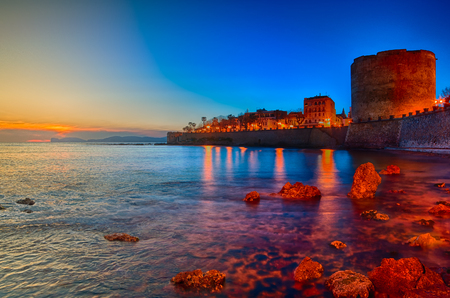 View of Alghero towers at nightの写真素材