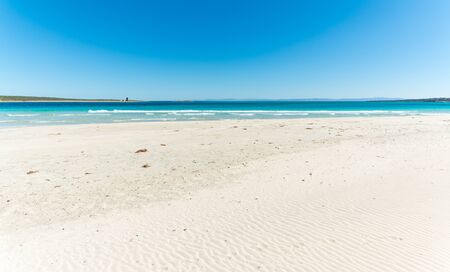 landscape of empty tropical beach with white sand and turquoise waterの写真素材