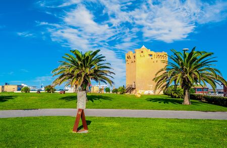 Aragonese tower in Porto Torres harbour in a sunny day - Sardinia