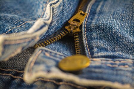 Closeup on blue jeans zipper and buttonの写真素材