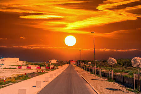 Deserted road at sunset
