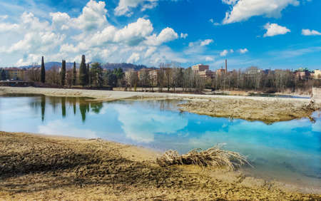 Casalecchio Dam on a sunny and cloudy day of springの写真素材