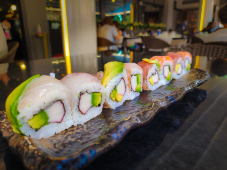 closeup on a portion of sushi in the restaurantの写真素材