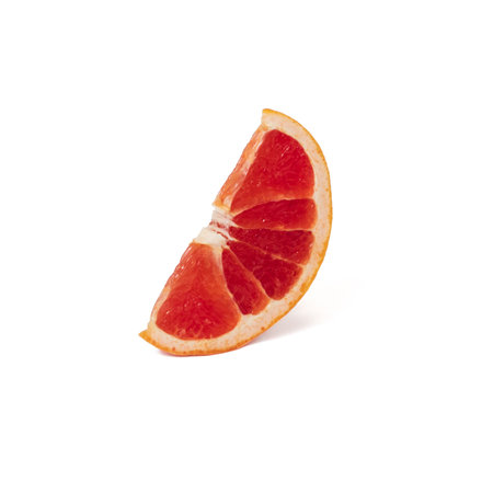 Pink ripe grapefruit slice on white isolated backgroundの写真素材