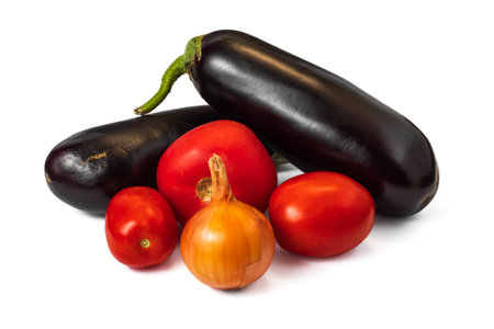 Fresh eggplants with tomatoes, onions isolated on white backgroundの写真素材