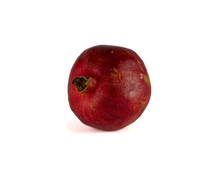 red ripe pomegranate on a white backgroundの写真素材