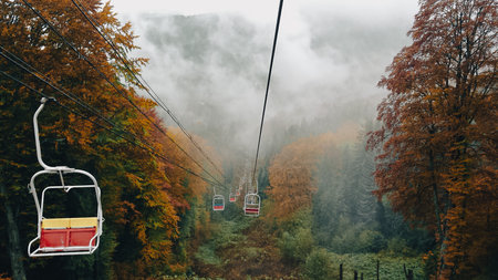 Cable car in autumn Carpathian mountainsの写真素材