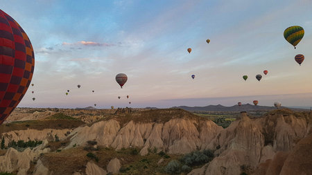 Cave house Cappadocia Turkey Hot air balloon flyingの写真素材
