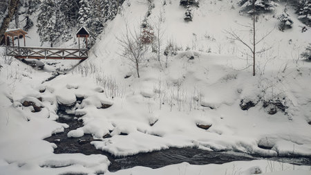 Huk waterfall, frozen waterfall at winter, Carpathian National Park. Ukraine.の写真素材