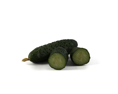 Fresh green gherkin cucumber with on white background.の写真素材
