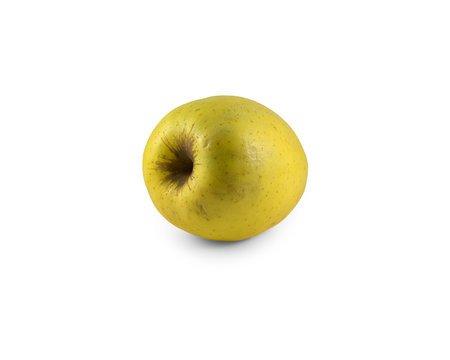 Image of a ripe yellow apple on a white backgroundの写真素材