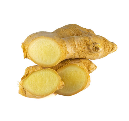 Fresh ginger rhizome with sliced isolated on white background.の写真素材