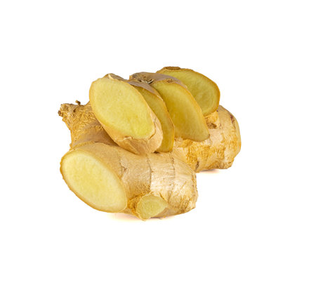Fresh ginger rhizome with sliced isolated on white background.の写真素材