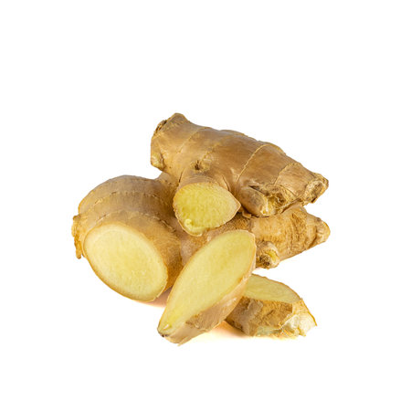 Fresh ginger rhizome with sliced isolated on white background.の写真素材