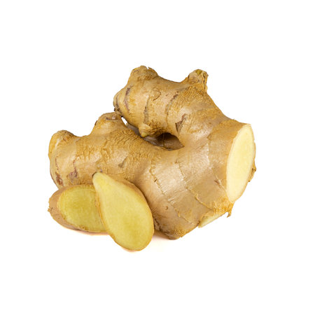 Fresh ginger rhizome with sliced isolated on white background.の写真素材