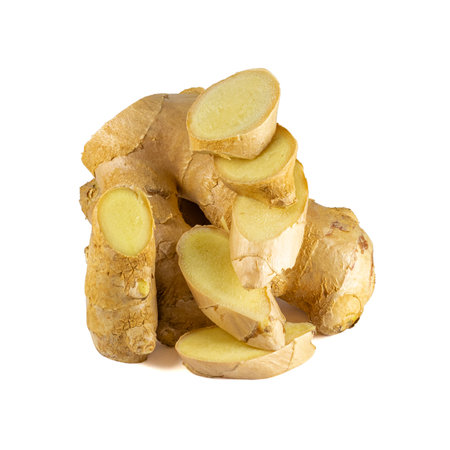 Fresh ginger rhizome with sliced isolated on white background.の写真素材
