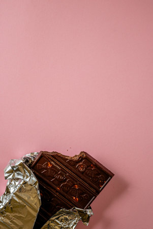 Chocolate bar pieces. Background with chocolate. Sweet food photo concept.の写真素材