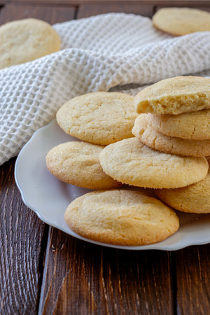 Delicious sugar cookies on wooden table, closeupの写真素材