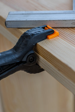 angle and clothespin on board partial focusの写真素材