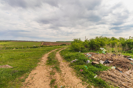 Pollution concept. Spontaneous uncontrolled landfill. Lytachi Ukraine 06.05.2024の写真素材