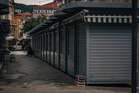 Rijeka Croatia 25.06.24 Closed shops, and boxes of nectarines on the ground