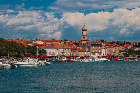 Krk Croatia 28.06.24View from the sea to the pier, the old town and the churchのeditorial素材