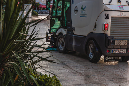 Krk Croatia 28.06.24A car washes the pedestrian zone near the portのeditorial素材