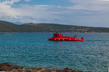 Krk Croatia 26.06.24 Tourist red submarine on an excursionのeditorial素材