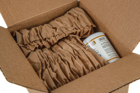 Lviv Ukraine 08.17.24 open iherb box top view on white backgroundのeditorial素材