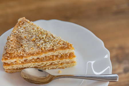 a delicious piece of homemade apple cake on a white plate