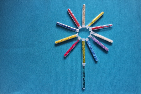 pattern of tubes with small beads flower blue backgroundの写真素材