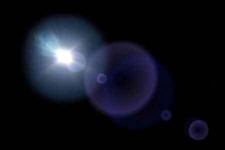Colorful light Lens flare on black background.の写真素材