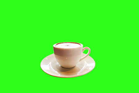Close-up Cappuccino coffee on green backgroundの写真素材
