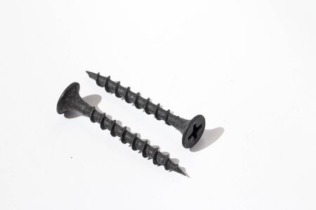 Self-tapping screw with hardened cement steel thread for fastening to metal and woodの写真素材