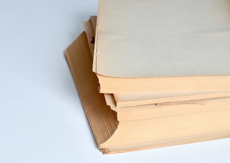 stack of blank clean white paper isolated on white for work or notes