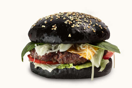 black burger on chalkboard with french friesの写真素材