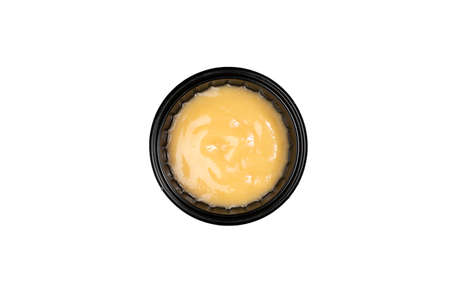 soy sauce in a dish for sauces on a white backgroundの写真素材