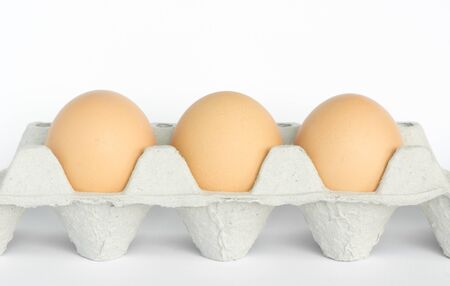 three of eggs in tray