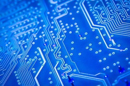 closeup of blue circuit computer motherboard
