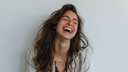 Portrait of a beautiful young woman with long brown hair laughing, ai generativeの素材