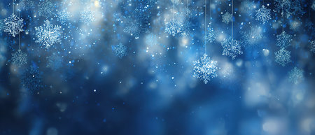 Elegant blue background with glowing snowflakes and soft bokeh lights.の素材