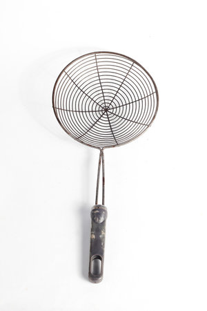 Sieve for sieve on white background, close up of photo