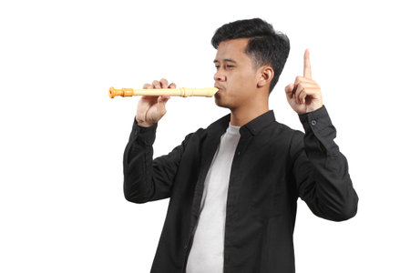 Young asian man playing flute isolated on a white background.