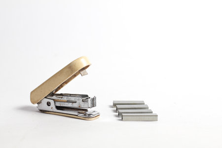 Stapler and staples on a white background. Isolated.の写真素材