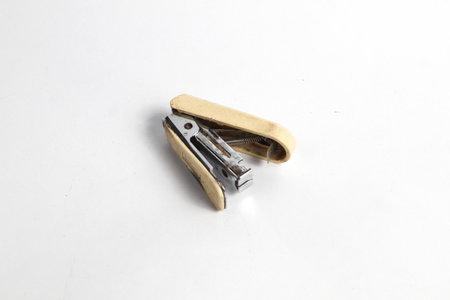 Old stapler isolated on white background. Clipping path included.