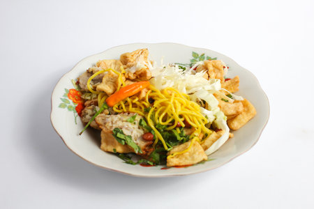 fried noodle with chicken on plate