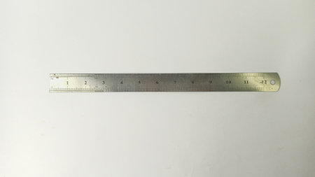Ruler on a white background, close-up of a ruler