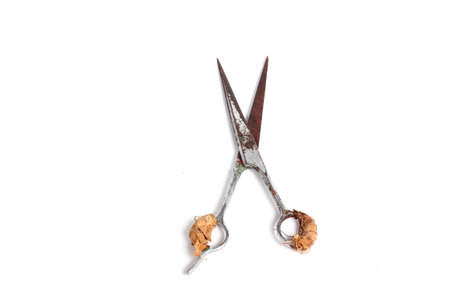 Old scissors isolated on a white background. Clipping path included.