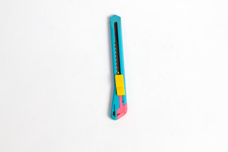 Plastic knife on a white background. Plastic knife on a white background.